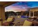 Beautiful outdoor living space with a pool, spa, pergola, and patio seating, ideal for relaxing or entertaining at 3930 E Enrose St, Mesa, AZ 85205