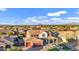 Stunning two-story home with red garage doors, well-manicured landscaping, and a welcoming front porch at 3930 E Enrose St, Mesa, AZ 85205