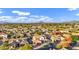 Gorgeous two-story home with a spacious three-car garage, beautiful landscaping, and a cozy front porch at 3930 E Enrose St, Mesa, AZ 85205