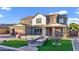 Beautiful two-story home with well-maintained lawn and a charming brick-lined walkway at 3930 E Enrose St, Mesa, AZ 85205