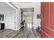 Grand foyer featuring hardwood floors, high ceilings, and an open floor plan leading to the backyard at 3930 E Enrose St, Mesa, AZ 85205