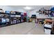 The garage is well-equipped for storage and projects with shelves, worktables and plenty of workspace at 3930 E Enrose St, Mesa, AZ 85205
