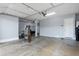 Spacious garage with gray walls, a polished cement floor and plenty of space for storage or hobbies at 3930 E Enrose St, Mesa, AZ 85205