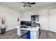 Well-organized home office with white paneling, dual monitors, and a sleek, functional workspace at 3930 E Enrose St, Mesa, AZ 85205