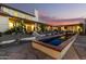 Backyard patio with desert landscaping and pool feature at 44434 N 20Th St, New River, AZ 85087