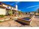 Gorgeous backyard featuring a pond, beautiful plants, and well-manicured landscaping at 44434 N 20Th St, New River, AZ 85087