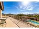 Relaxing balcony with scenic views of the surrounding hills and pool area at 44434 N 20Th St, New River, AZ 85087
