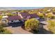 Beautiful home aerial with a large circular driveway in a serene desert community at 44434 N 20Th St, New River, AZ 85087