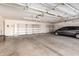 Garage with shelves and parking spot at 44434 N 20Th St, New River, AZ 85087