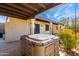 Covered patio featuring a hot tub at 44434 N 20Th St, New River, AZ 85087