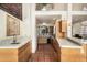 Well-lit kitchen features natural wood cabinetry, stone countertops, stainless steel appliances, and a window at 44434 N 20Th St, New River, AZ 85087