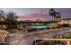 Beautiful backyard pool and pond with desert landscaping at 44434 N 20Th St, New River, AZ 85087
