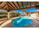 Inviting pool with a covered patio, perfect for relaxation and entertainment at 44434 N 20Th St, New River, AZ 85087