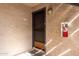 The front door is painted dark blue, and the unit number is visible above the door at 4444 E Paradise Village N Pkwy # 132, Phoenix, AZ 85032