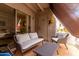 Outdoor patio with comfortable seating, flowers, and an inviting space at 4444 E Paradise Village N Pkwy # 132, Phoenix, AZ 85032