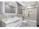 Modern bathroom featuring a stylish vanity and bathtub with sleek, gray accents at 4748 E Redfield Rd, Phoenix, AZ 85032