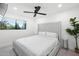 Modern bedroom with a large window and minimalist decor at 4748 E Redfield Rd, Phoenix, AZ 85032