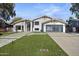 Stunning home with modern landscaping and a well-maintained lawn at 4748 E Redfield Rd, Phoenix, AZ 85032