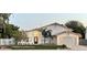 Charming single Gathering home boasts well-manicured lawn and desert landscaping at 4748 E Redfield Rd, Phoenix, AZ 85032