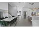 Open-concept kitchen and dining area showcasing modern finishes and stylish furnishings at 4748 E Redfield Rd, Phoenix, AZ 85032