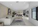 Spacious living area featuring stylish decor, neutral tones and an open layout at 4748 E Redfield Rd, Phoenix, AZ 85032