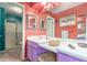Stylish bathroom with a large mirror, double vanity, and shower at 508 N Sierra Vista Dr, Wickenburg, AZ 85390