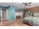 Spacious bedroom with tile floors, closet, and neutral walls at 508 N Sierra Vista Dr, Wickenburg, AZ 85390