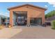 Large garage with a high ceiling, storage, and space for a RV or boat at 508 N Sierra Vista Dr, Wickenburg, AZ 85390