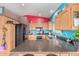 Bright kitchen featuring stainless steel appliances, ample counter space, and colorful decor at 508 N Sierra Vista Dr, Wickenburg, AZ 85390