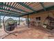 Charming covered patio with hanging egg chairs, ideal for outdoor lounging and relaxation at 508 N Sierra Vista Dr, Wickenburg, AZ 85390