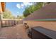 Functional side yard with gravel, perfect for gardening or storage, complemented by a secure dog run at 508 N Sierra Vista Dr, Wickenburg, AZ 85390