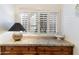 Close-up on the counter with cabinets and plantation shutters on the window at 7327 E Via Estrella Ave, Scottsdale, AZ 85258