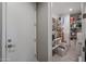 Walk-in pantry offers ample storage space with shelving and room for organizational boxes at 7735 W Agora Ln, Phoenix, AZ 85043
