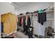 Walk-in closet offering ample space for storage and organization at 7735 W Agora Ln, Phoenix, AZ 85043