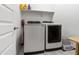 Well-lit laundry room with new washer and dryer units at 8804 W Vista Ave, Glendale, AZ 85305