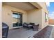 Charming covered patio with ample seating, ideal for enjoying outdoor living and dining experiences at 8804 W Vista Ave, Glendale, AZ 85305