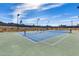 Outdoor tennis court surrounded by desert landscape, perfect for sports and recreation at 10203 N 12Th Pl # 3, Phoenix, AZ 85020