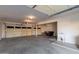Spacious garage with concrete flooring, ample storage space, and a utility sink at 10318 E Irwin Ave, Mesa, AZ 85209