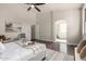 A main bedroom with high ceilings leading to the bathroom with a soaking tub at 10318 E Irwin Ave, Mesa, AZ 85209