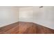 An empty bedroom features hardwood floors and neutral color palette at 10419 W Loma Blanca Dr, Sun City, AZ 85351