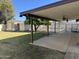 Inviting outdoor space with covered patio, fenced pool, and storage shed at 10633 N 46Th Ave, Glendale, AZ 85304