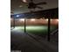 The backyard features a grass lawn and a covered porch at 10633 N 46Th Ave, Glendale, AZ 85304