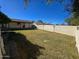 Large backyard offers ample space for outdoor activities, including plenty of green grass at 10633 N 46Th Ave, Glendale, AZ 85304