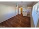 Bedroom with wood floors and en suite bathroom at 10633 N 46Th Ave, Glendale, AZ 85304