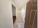 Welcoming entryway with neutral tile flooring and fresh paint leading to various living areas at 10633 N 46Th Ave, Glendale, AZ 85304