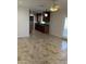 Eat-in kitchen featuring stylish granite countertops, dark wood cabinets, and tile flooring at 10633 N 46Th Ave, Glendale, AZ 85304
