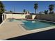 A pristine pool features blue tile accents and a concrete deck, perfect for relaxing at 10633 N 46Th Ave, Glendale, AZ 85304