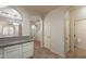 Kitchen area featuring granite counters, white cabinetry, and an open view to the staircase at 1088 S Storment Ln, Gilbert, AZ 85296