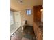 Well-appointed bathroom featuring a walk-in shower, granite counters, and custom wood cabinetry at 113 W Bluefield Ave, Phoenix, AZ 85023