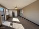 Enclosed sunroom with lots of light, a ceiling fan, and lots of space at 113 W Bluefield Ave, Phoenix, AZ 85023